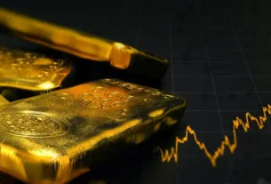 How can a beginner invest in gold?